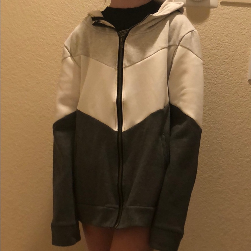 White, grey, and black oversized zip up sweater